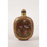 A Chinese redware pottery snuff bottle with enamelled decoration of birds amongst peach and