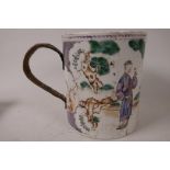 An antique Chinese famille rose tankard with wicker bound metal handle, 5½" high