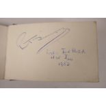 An autograph album containing numerous signatures of England cricketers from the 1940s-50s