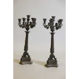 A pair of Empire style bronze five branch candelabra, 24" high
