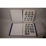 Two albums of world stamps, 12" x 10"
