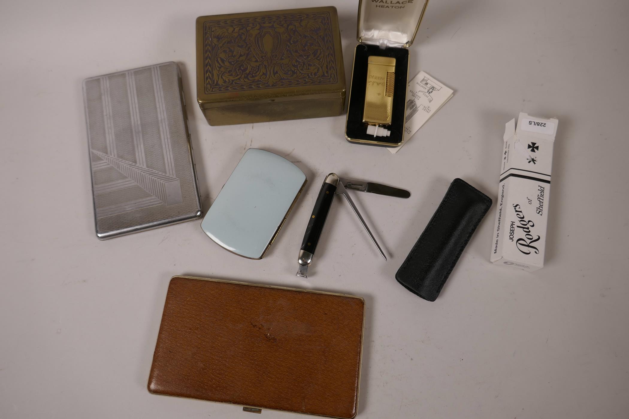 A brass State Express cigarette tin and small enamelled cigarette case, a Wallace Heaton gold plated