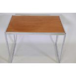 A chrome and teak occassional table by Howard Miller, 19"x 25"x 16"