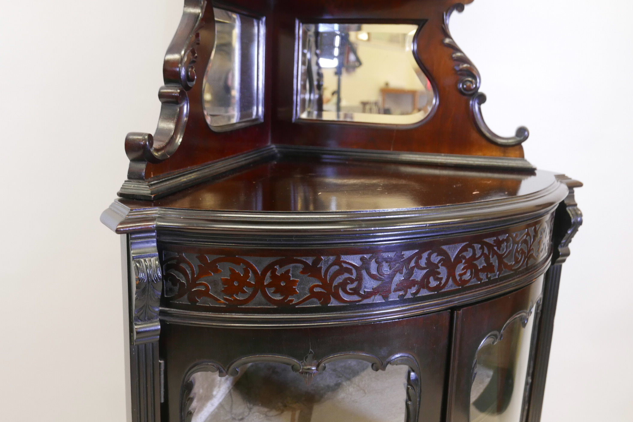 A Victorian mahogany bowfronted corner display cabinet, the upper section with mirror backed - Image 3 of 3