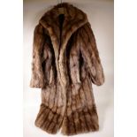 A vintage full length fur coat