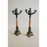 A pair of marble and bronze mounted Empire style three branch candelabra, A/F losses, 24" high