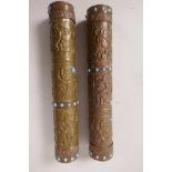 A pair of Tibetan Buddhist enamel metal prayer/incense holders inset with turquoise coloured