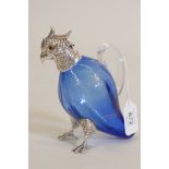 A small blue glass decanter in the form of a cockatoo, silver plated mounts, faults to glass, 6"