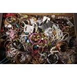 A large box of costume jewellery