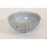 A Chinese crackle glazed bowl with ribbed body and shaped rim, 5" diameter