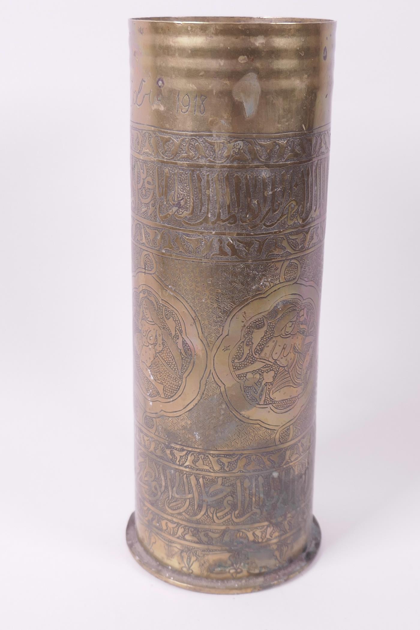 Trench Art, a brass shell case engraved with panels of figures, Persian patterns and script,