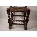 A C19th rush seated turned oak stool, 16"x 14"x 11"