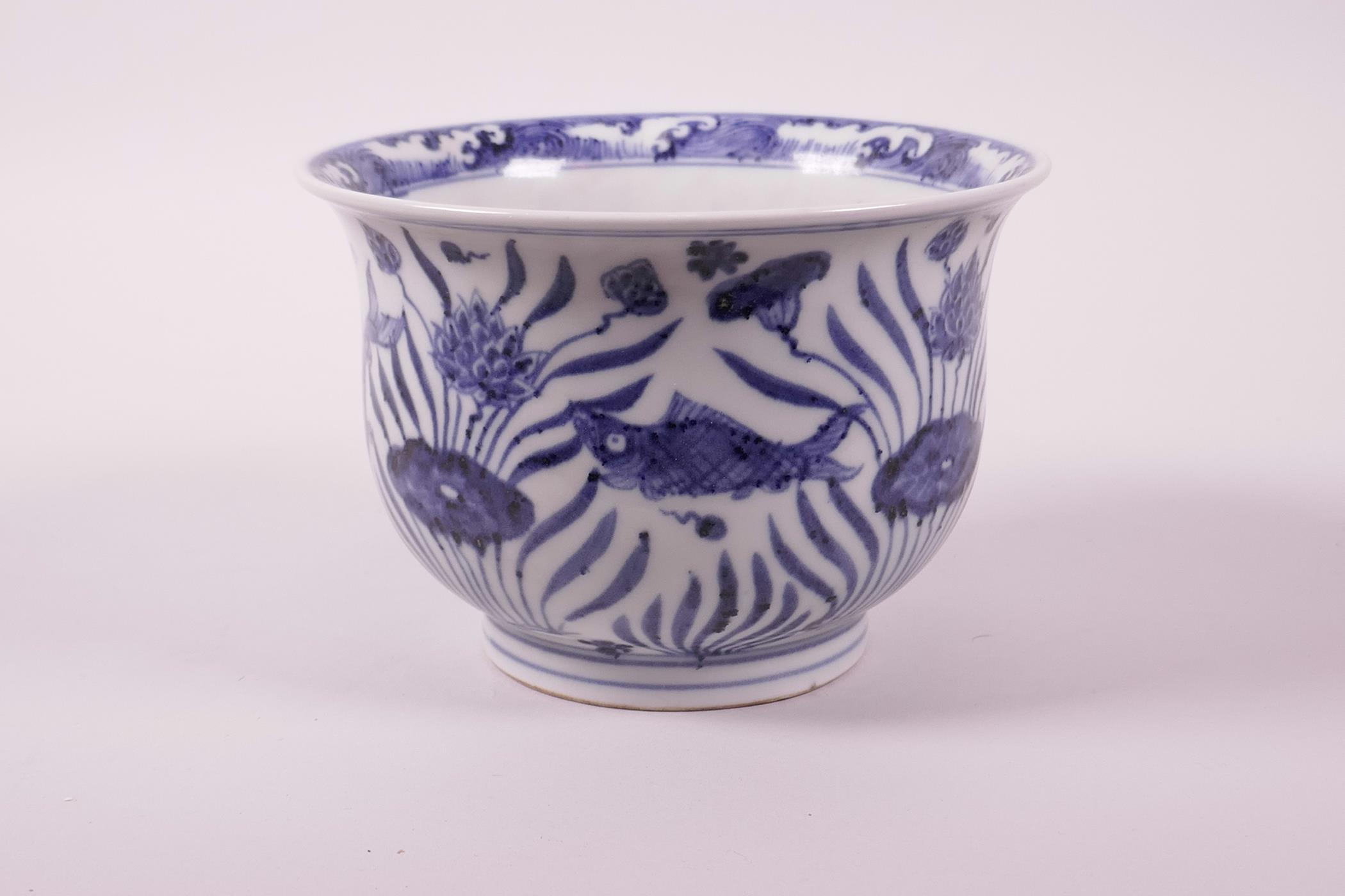 A Chinese blue and white porcelain steep sided bowl decorated with carp in a lotus pond, 4" high x - Image 2 of 7