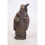 A Chinese bronze figure of Shao Lao, 8" high