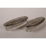 A pair of oval hobnail cut glass pin dishes with hallmarked silver lids, Birmingham 1912, 17 grams