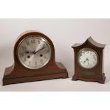 A mahogany cased pagoda shaped mantel clock with white enamel face and Arabic numerals, 8" high,