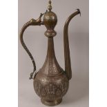 A good Middle Eastern bronze ewer, with fine inlaid copper and silver decoration, and Islamic