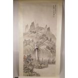A Chinese watercolour scroll depicting a river, waterfall and distant mountains, 16" x 37"