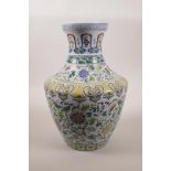 A Chinese doucai porcelain vase with scrolling floral decoration, seal mark to base, 12½" high