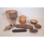 A quantity of African tribal items to include woven baskets, gourd containers, a drum, terracotta