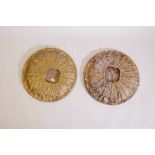 Two carved giltwood wall plaques, 21" diameter