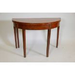 A George III inlaid mahogany demi-lune tea table, 42"x 21"x 28" high