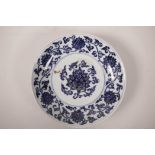 A Chinese blue and white porcelain dish with lotus flower decoration, 6 character mark to base,