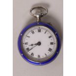 A lady's silver and enamel fob watch with gilt embellishments, having white enamel dial and Roman