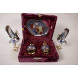 A boxed cruet set of salt, pepper and tray, together with cloisonné figurines of wading birds