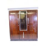 An Art Deco mahogany wardrobe with chrome mounts and a glazed central door over two drawers, 63"x