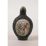 A Chinese copper snuff bottle with Canton enamel panels depicting bats, fruit and pi discs, 4