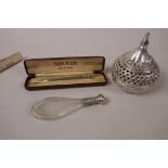 An Omani silver fruit shaped incensor with pierced and engraved decoration, 3½" high, marked 925,