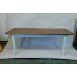 A C19th French pine plank top farmhouse table with a painted base, 78" x 32", 30" high