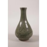 A Chinese Song style celadon crackle glazed pottery vase with incised cursive script decoration,