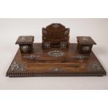 A C19th rosewood desk standish with letter rack and twin inkwells, with applied white metal