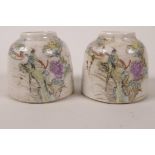 A pair of Chinese porcelain ink pots decorated with exotic birds on a flowering branch, 2½" high