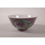 A Chinese famille rose enamel porcelain rice bowl with blue panels decorated with flowers, 4