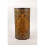 A large Chinese lacquer brush pot with engraved and painted character inscriptions, bats and