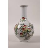 A Chinese polychrome porcelain vase with enamelled peach tree decoration, seal mark to base, 10"