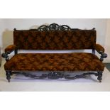 A William IV ebonised and carved wood 3/4 seater settee, 81½" x 30", 44" high