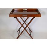 A mahogany butler's tray on a turned stand, 31"x 28"x20"
