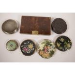 Two Stratton powder compacts, one decorated with a romantic scene, the other with tapestry