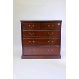 A Victorian mahogany chest of two over three moulded front drawers, fitted with brass swan neck