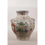 A Chinese wucai pottery vase with two mask handles, decorated with figures in a garden scene, 6