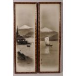 A pair of Japanese monochrome watercolours of Mount Fuji with fishing scenes to foreground,