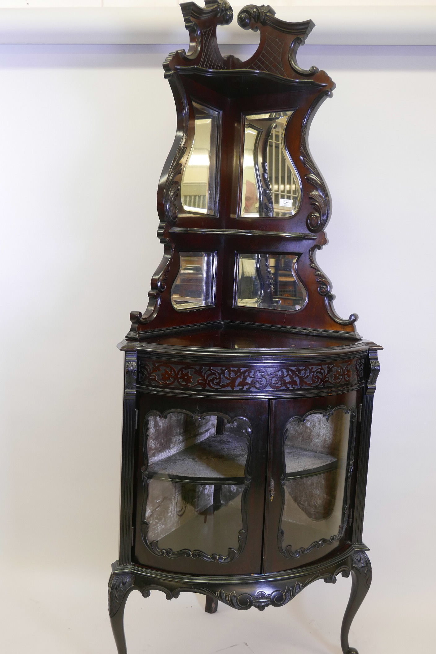 A Victorian mahogany bowfronted corner display cabinet, the upper section with mirror backed - Image 2 of 3