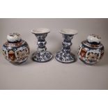 A pair of large Chinese blue and white porcelain candlesticks decorated with birds and flowers,