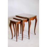 A nest of three parquetry inlaid mahogany occasional tables with ormolu mounts, 20" x 16" x 23"
