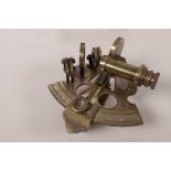 A replica brass 'Victorian travelling sextant' by Smith and Co, 3¾" x 3¾", in a hardwood box with