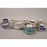 A collection of antique and decorative cups, teabowls and saucers including an early Whorl pattern